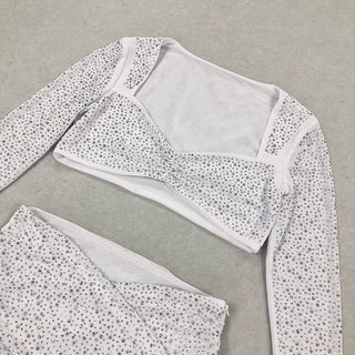 ALESSIA - Ensemble deux pièces tendance avec haut à manches longues et col carré et strass brillants, jupe longue fendue sexy, élégant et célèbre, idéal pour une soirée ou un club